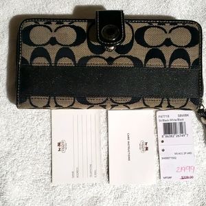 Coach tri wallet, signature canvas with leather interior, Black